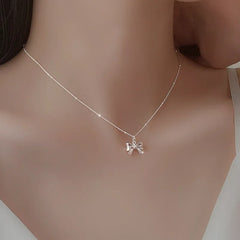 Chic Bow Choker - Elegant Silver Necklace with Delicate Pendant